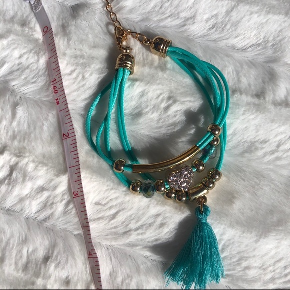 Beautiful teal banded bracelet with jeweled heart - Picture 6 of 11